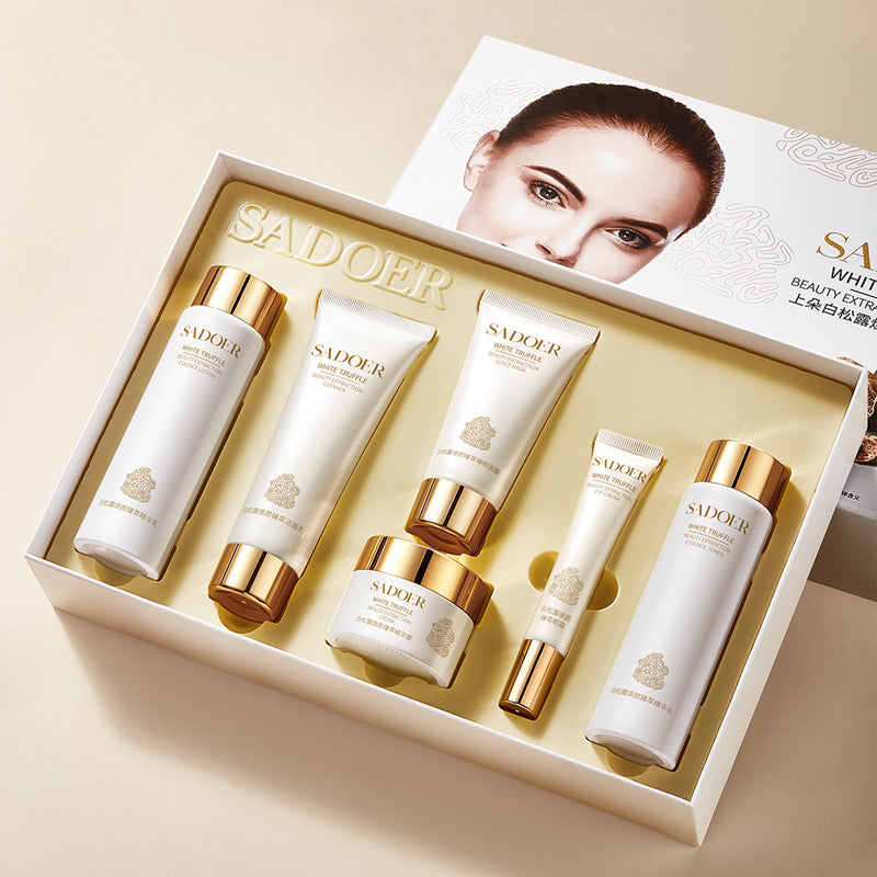 SADOER White Truffle skincare gift set with six gold-capped bottles and tubes in box